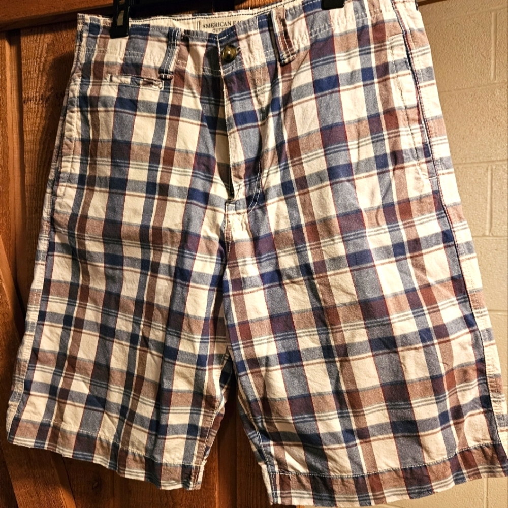Men's Shorts in a burgundy, navy, and cream plaid. Size 32.